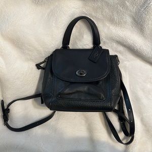 COACH Mini Pebbled Leather Faye Backpack in Black.